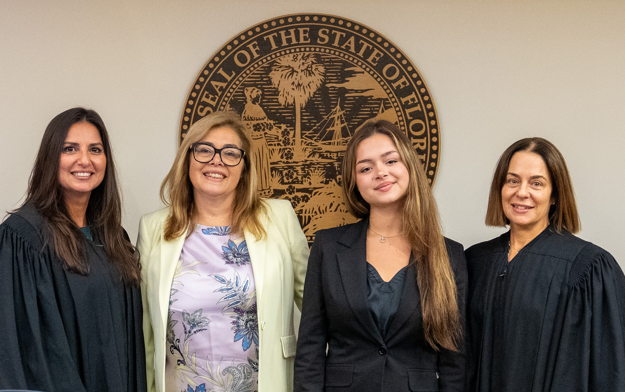 Judges Alicia Garcia Priovolos and Marlene Fernandez‑Karavetsos, and Jason Dimitris Welcome Visitors from Greece